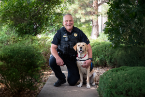 Deputy Brian Corbin and Guster. (Photo courtesy of Freedom Service Dogs)